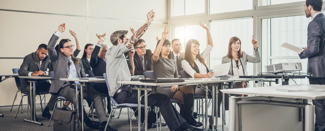 professionals sitting in training class